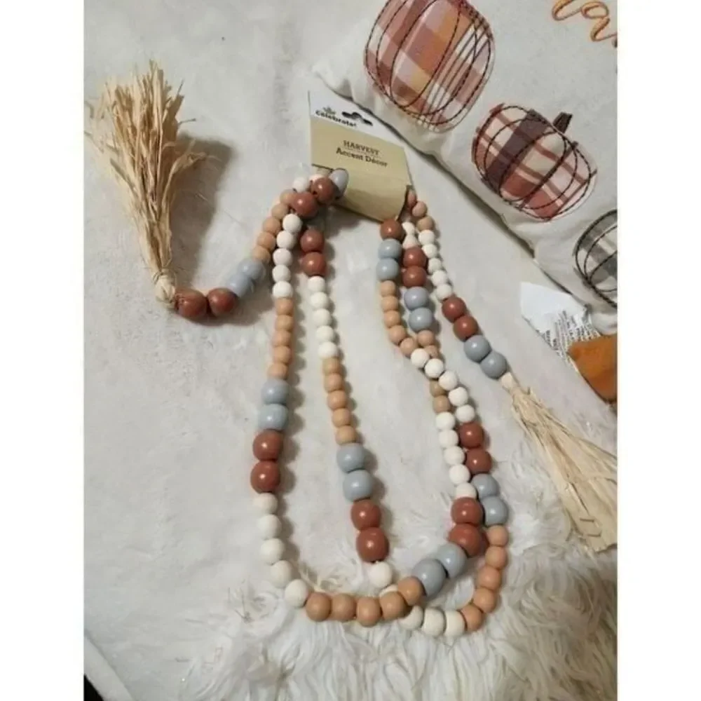 NWT Fall/harvest pumpkin decorative pillows set of 2 and wooden beads garland